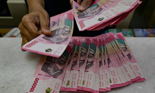 Nhà đầu tư ngoại ồ ạt bán tài sản Indonesia