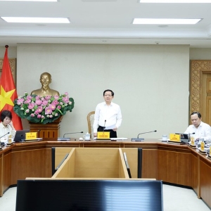 Phó Thủ tướng Hồ Quốc Dũng chủ trì cuộc họp - Ảnh: VGP.