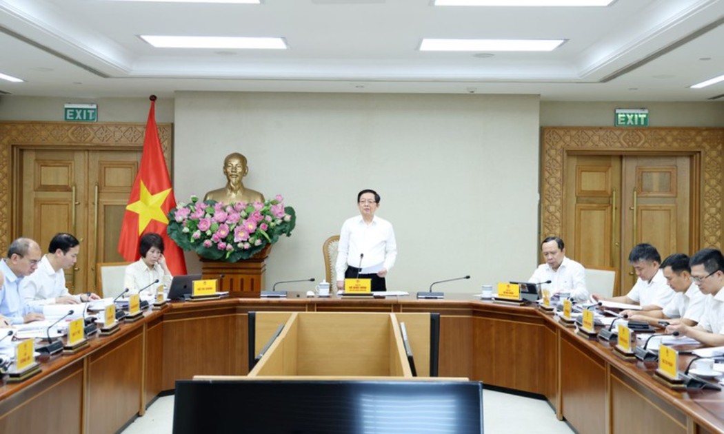 Phó Thủ tướng Hồ Quốc Dũng chủ trì cuộc họp - Ảnh: VGP.