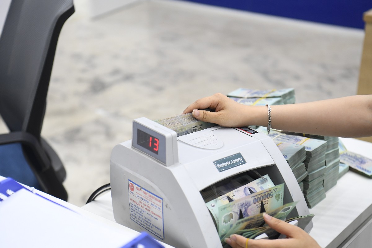 Tín dụng tăng nhanh hơn huy động từ năm 2021 đến nay làm gia tăng mất cân đối cơ cấu nguồn vốn của hệ thống ngân hàng (Ảnh: PL)
