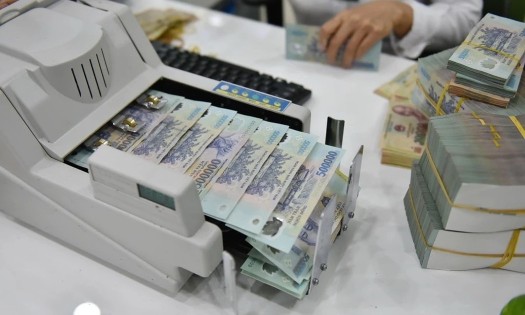 Ngân hàng Nhà nước yêu cầu các ngân hàng duy trì bộ đệm thanh khoản, không bị động khi Kho bạc Nhà nước thu hồi trước hạn các khoản tiền gửi (Ảnh: PL).