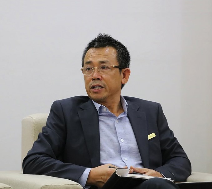 Mr. Thai Nhu Hiep, Vice Chairman of the Vietnam Coffee and Cocoa Association and Chairman and General Director of the Vinh Hiep Co., Ltd..