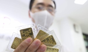 Chênh lệch giá vàng trong nước về sát vàng thế giới. Ảnh: Duy Linh