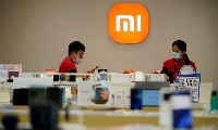 Xiaomi bắt đầu đẩy mạnh chương trình phát triển chip lớn từ năm 2021 và đang hướng tới cạnh tranh với Apple, Samsung Electronics và Huawei. Ảnh: Reuters