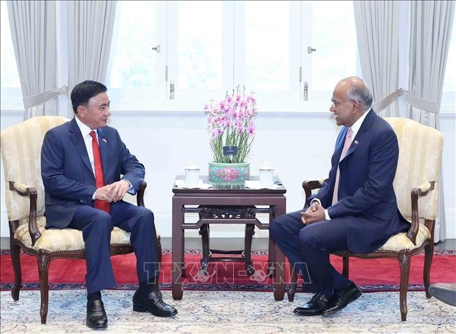 Thường trực Ban Bí thư Trần Cẩm Tú gặp Bộ trưởng Cao cấp, Bộ trưởng Điều phối An ninh Quốc gia và Bộ trưởng Nội vụ Singapore K. Shanmugam. Ảnh: Phương Hoa - TTXVN