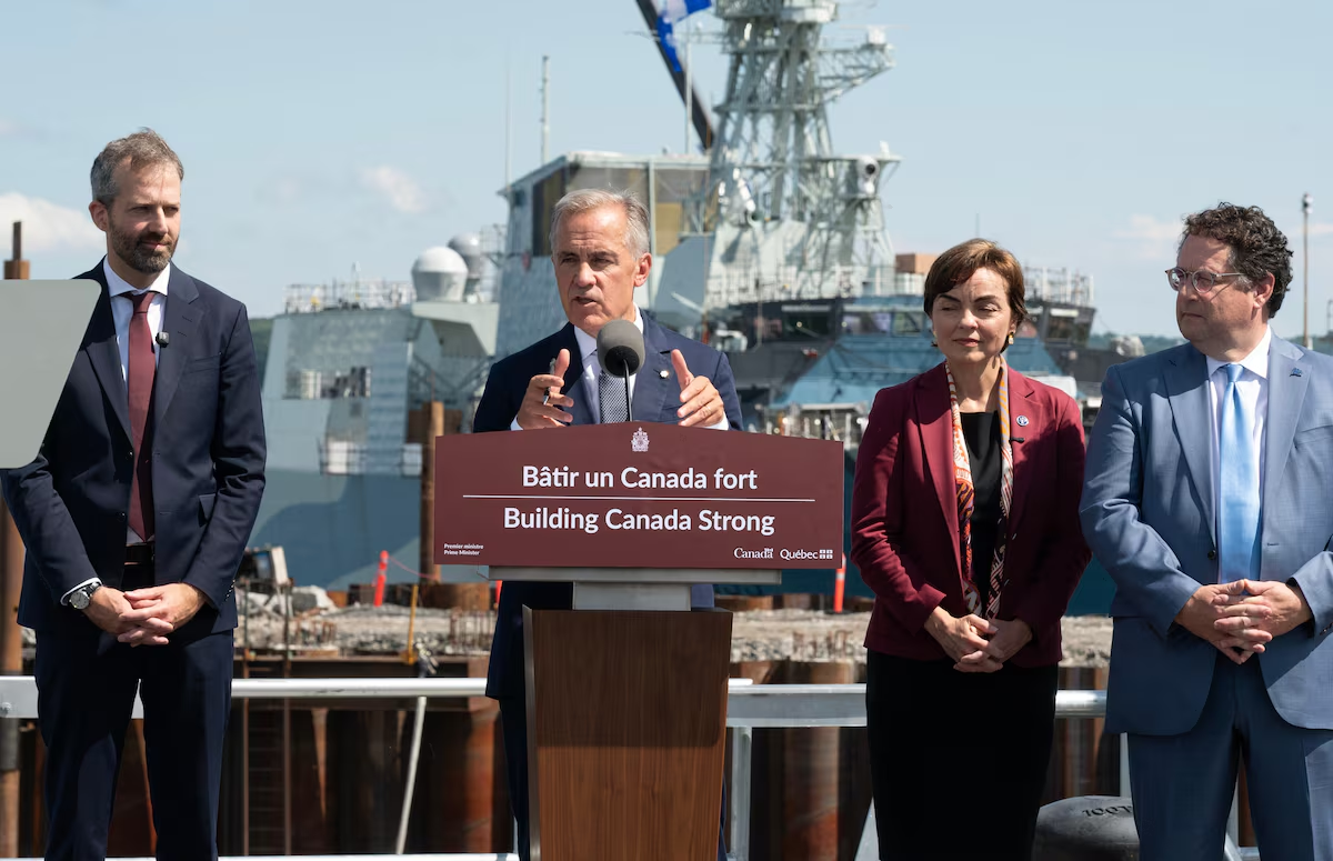 Thủ tướng Canada Mark Carney (thứ hai từ trái sang) tại một sự kiện vào ngày 24/8 - Ảnh: The Canadian Press.