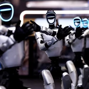 Robot hình người của Unitree Robotics trình diễn múa tập thể tại Hội nghị Robot Thế giới 2026 ở Bắc Kinh, Trung Quốc. Ảnh: REUTERS/Tingshu Wang.