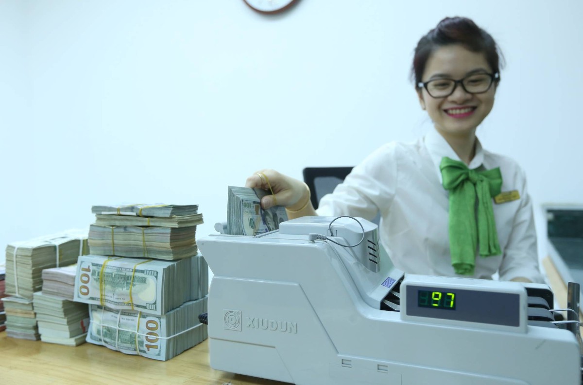 Ngân hàng Nhà nước linh hoạt điều tiết thanh khoản, tạo vùng đệm cho tỷ giá (Ảnh: Duy Linh).