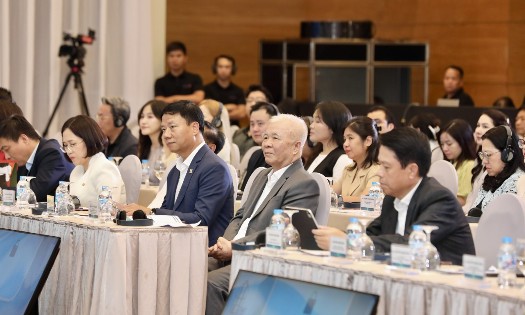 Delegates attend the seminar titled “Promoting Cross-Border Payment via QR Code: A New Driver for Retail and Tourism” on September 25. (Photo: Viet Dung)