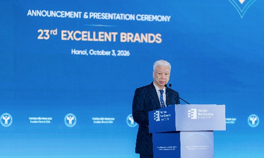 Mr. Dao Quang Binh, Secretary General of the Vietnam Economic Association and Deputy Chairman of the Editorial Board of Tap chi Kinh te Viet Nam/Vietnam Economic Times/VnEconomy, is speaking at the event. (Photo: Viet Dung)