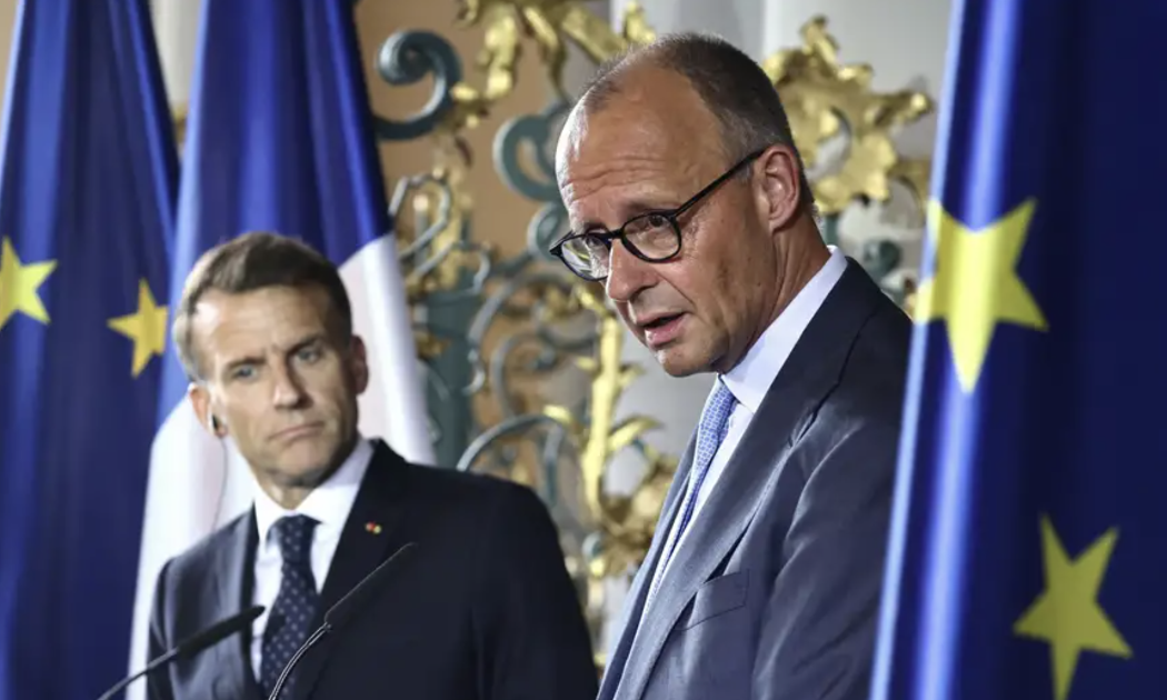 Tổng thống Pháp Emmanuel Macron (trái) và Thủ tướng Đức Friedrich Merz - Ảnh: DPA/DW.