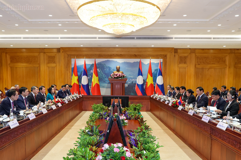 Thủ tướng Chính phủ Lê Minh Hưng hội kiến Chủ tịch Quốc hội Lào Sonexay Siphandone - Ảnh: chinhphu.vn/Nhật Bắc