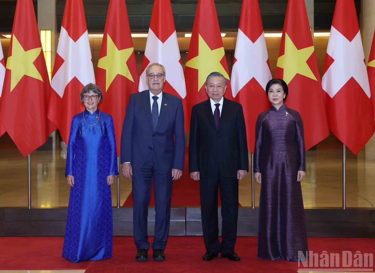Tổng Bí thư, Chủ tịch nước Tô Lâm và Tổng thống Liên bang Thụy Sĩ Guy Parmelin. Ảnh: Nhân Dân