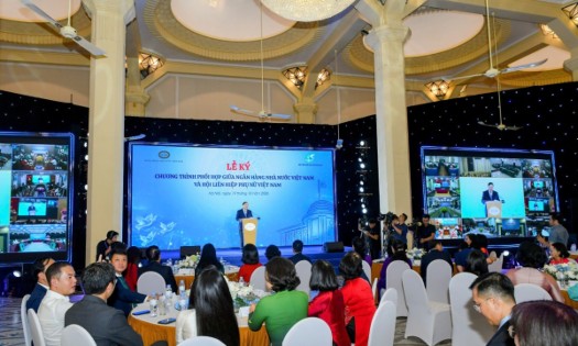 The signing ceremony between the State Bank of Vietnam and the Vietnam Womens Union. -(Photo: SBV)