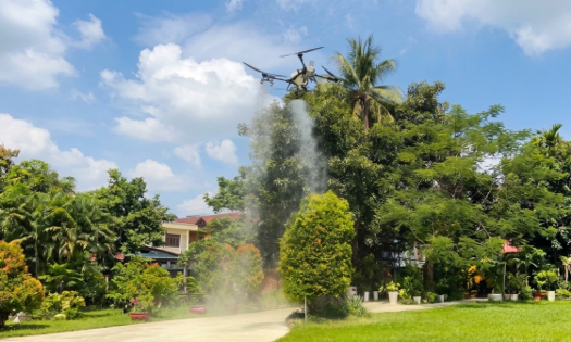 DJI Agriculture tiến hành cho bay thử thiết bị T55 trình diễn phun ngoài trời. Ảnh: DJI Agiculture.