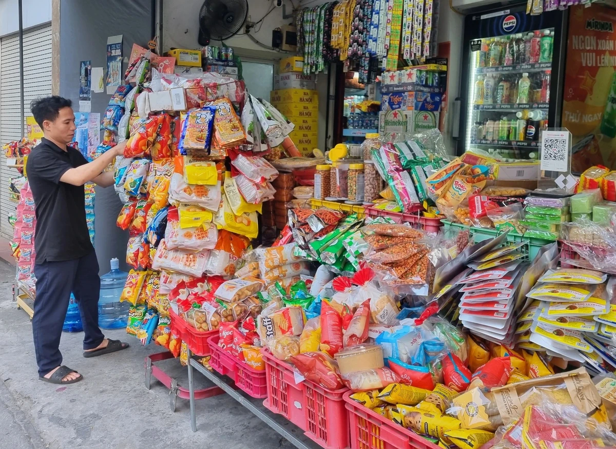 Doanh nghiệp, hộ kinh doanh chính thức được giảm 30% thuế thu nhập. Ảnh minh hoạ